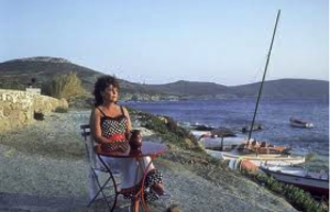 Stylish over fifty - Shirley Valentine sitting by the water - Pauline Collins film.png